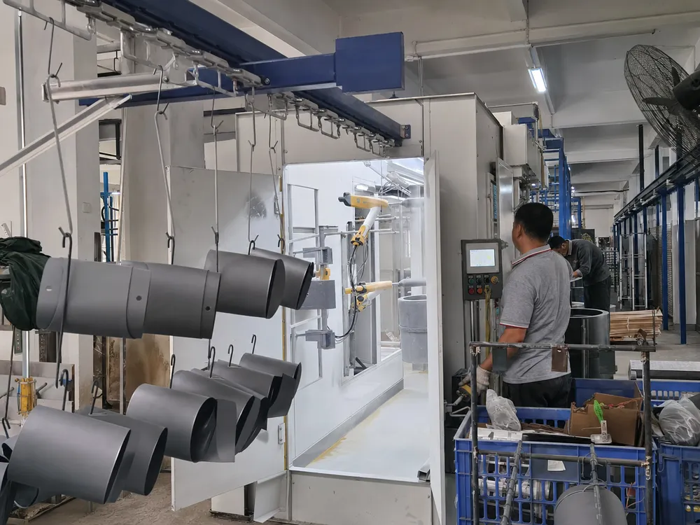 Automated powder coating line applying consistent 60-80μm finish thickness to wall sconce housings