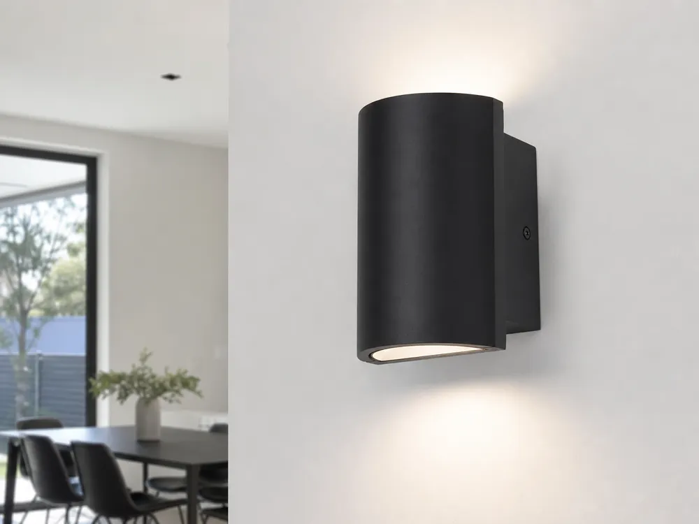 Modern wall lighting with clean geometry and minimal ornamentation in matte black finish