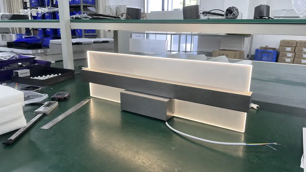 OEM wall lighting prototype with production-intent finishing on workbench