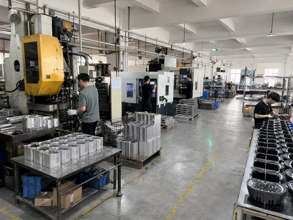 ASCLighting 12,000 m² in-house production facility with die-casting, CNC machining, and assembly lines