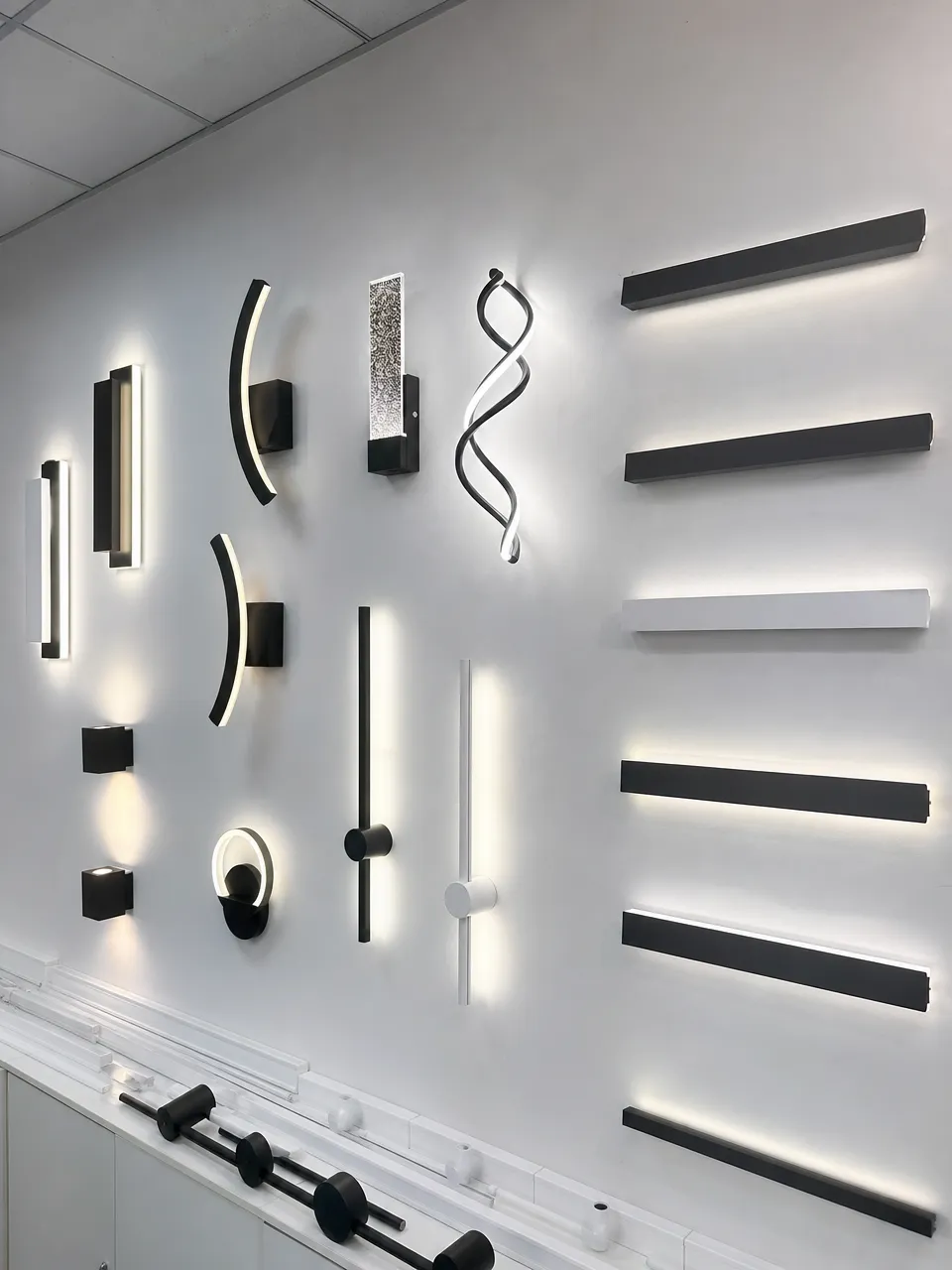 LED wall lighting fixtures manufactured by ASCLighting showing decorative sconces and linear wall fixtures