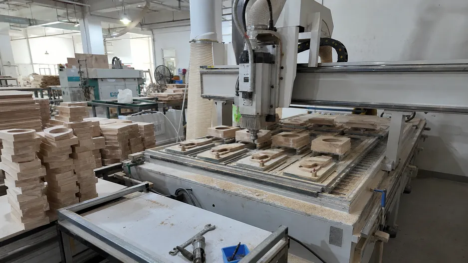 ASCLighting factory floor showing CNC machining of wooden wall lighting components in Guzhen, Zhongshan