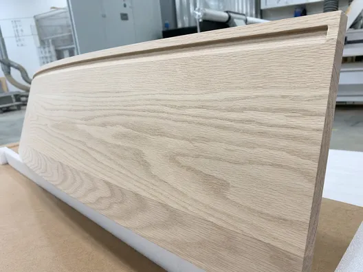 Oak wood grain detail showing consistent texture for wooden wall lighting manufacturing